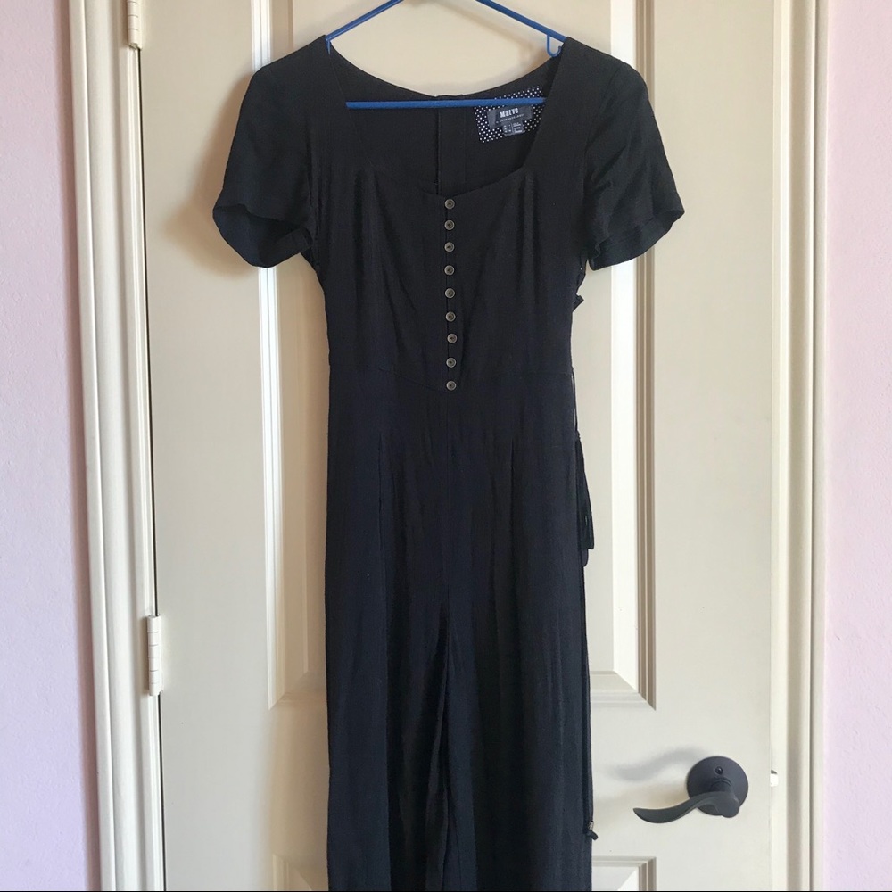 Anthropologie black jumpsuit with lace up sides